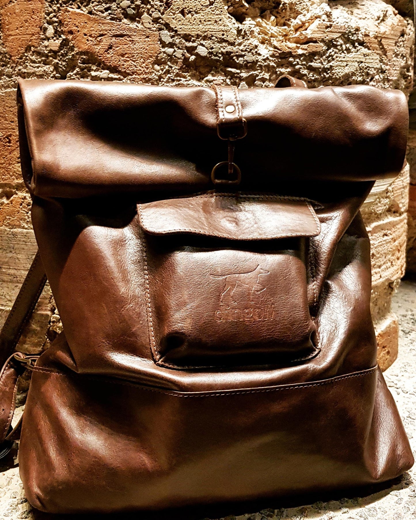 ROLL UP LEATHER BACKPACK